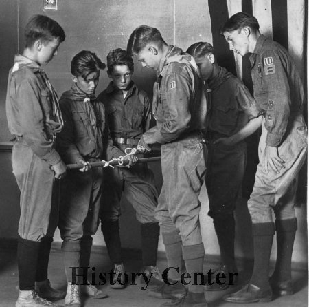 Boy Scouts learning knots, c. 1920