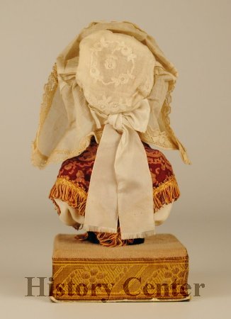 Powder Box with Doll Attached, back view